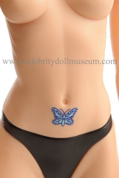 Drew Barrymore doll tattoo