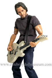 Keanu Reeves doll plays bass