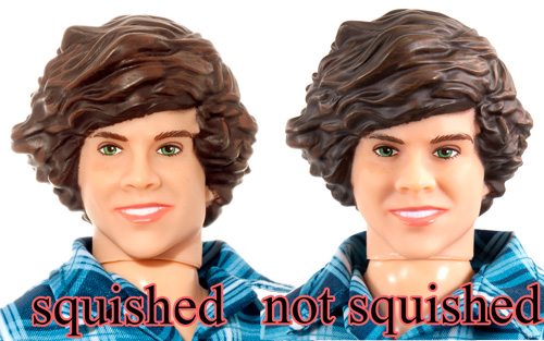 Hasbro Harry Styles ID doll with a squished head.