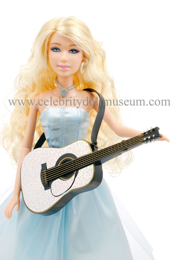 Taylor Swift making a video doll